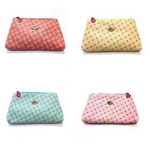 Virágmintás sárga neszesszer kiegészítőkkel